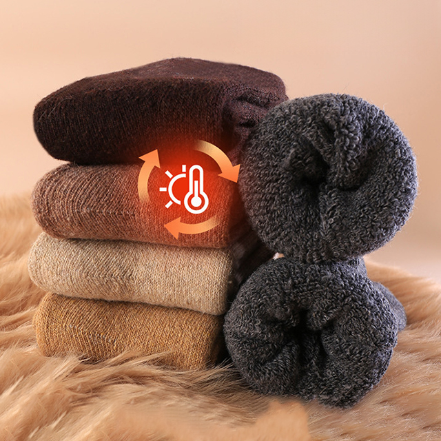 Wholesale men's autumn and winter thickened wool socks, warm pure-colored terry snowfield men's mid-calf socks